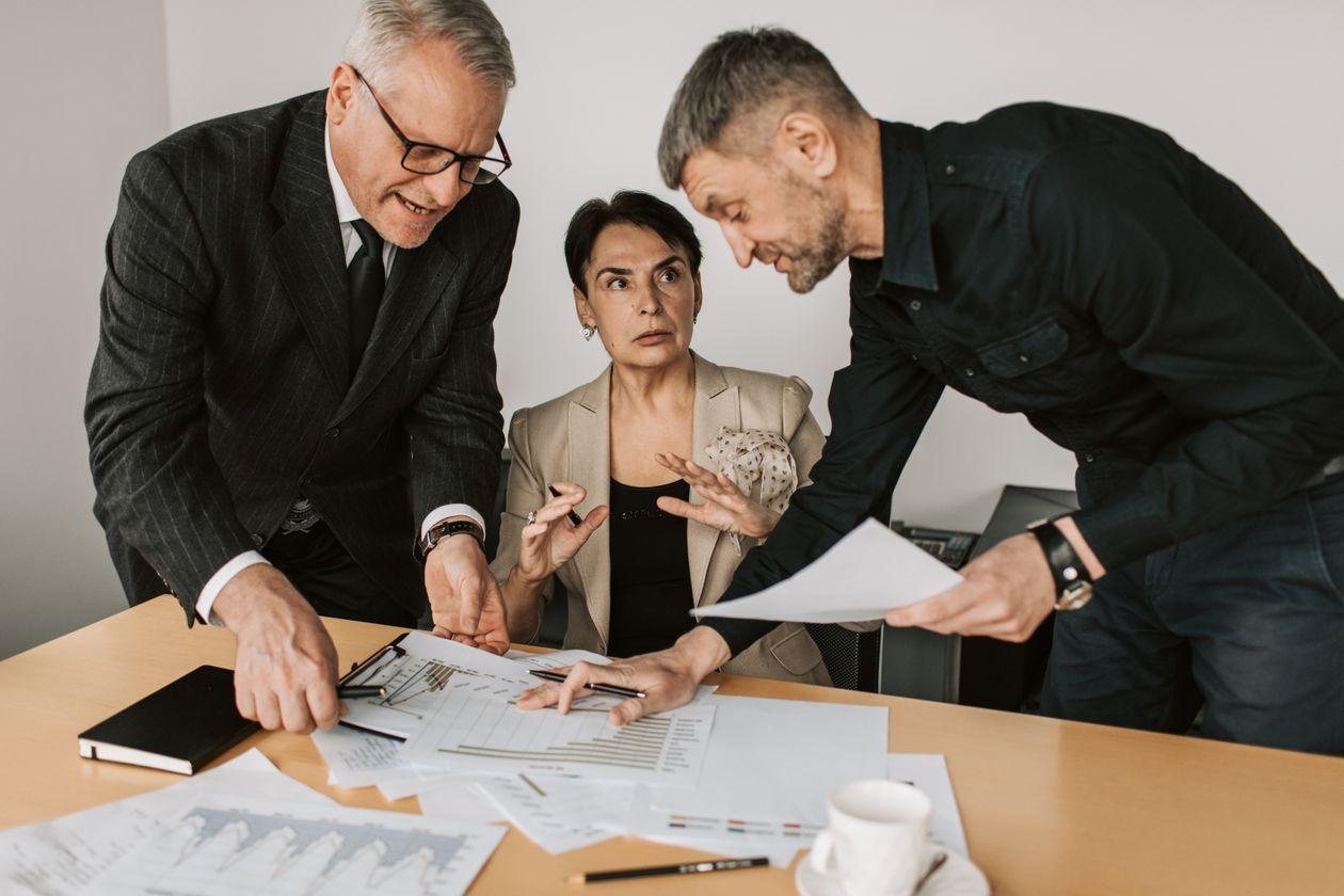 Non-technical founder comparing a growth-marketing agency and a software development partner for remaining launch budget